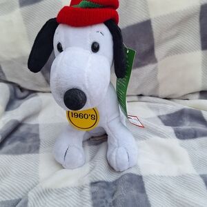 Festive White and Black Plush Dog with Red Hat